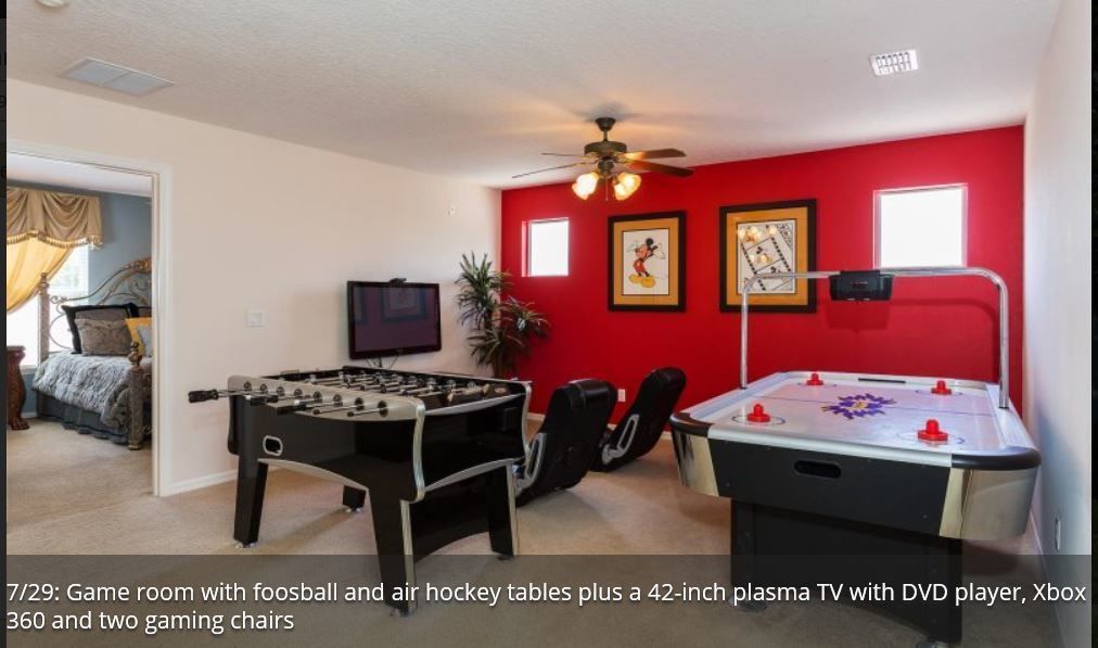 A game room with foosball and air hockey tables, a 42-inch plasma TV with DVD player, Xbox 360, and two gaming chairs.