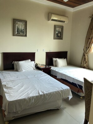 Desk, blackout drapes, free WiFi, bed sheets