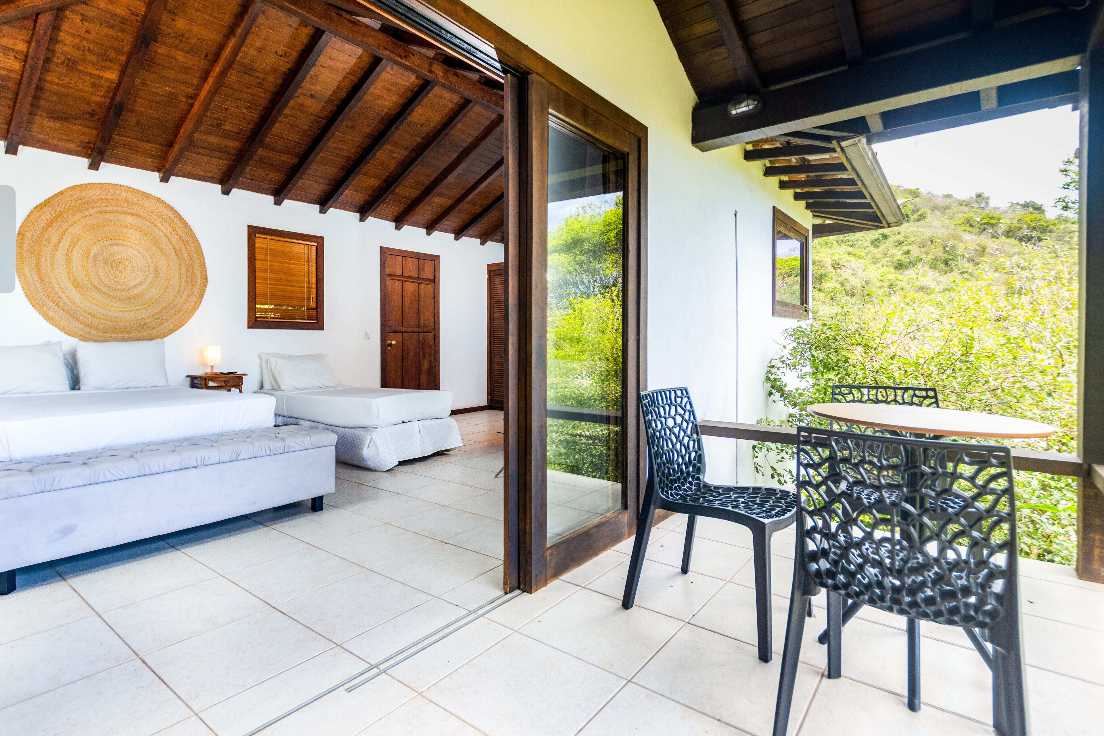 Superior Triple Room, Annex Building | Minibar, in-room safe, individually decorated, blackout drapes