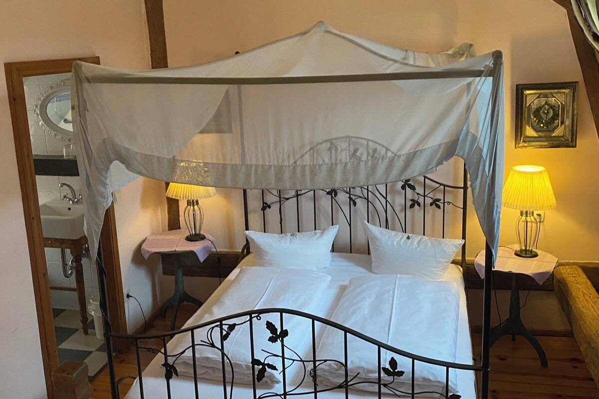 honeymoon room | hypo-allergenic bedding, desk, blackout curtains, iron/ironing board