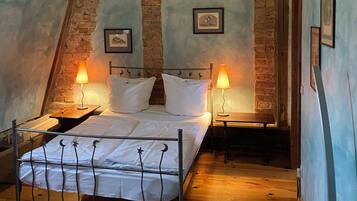 Superior Quadruple Room | Hypo-allergenic bedding, desk, blackout drapes, iron/ironing board