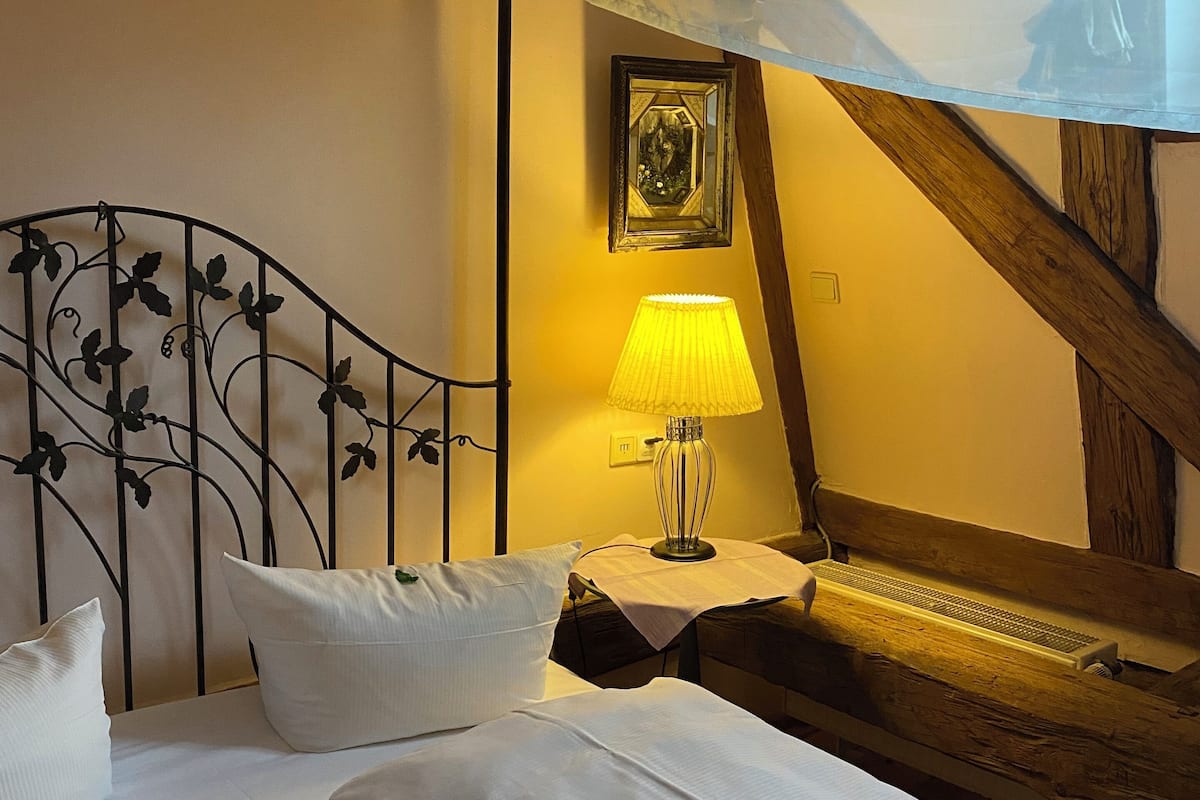 honeymoon room | hypo-allergenic bedding, desk, blackout curtains, iron/ironing board