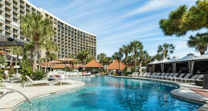 Oceanview condo with pools, hot tubs, sauna, and two balconies