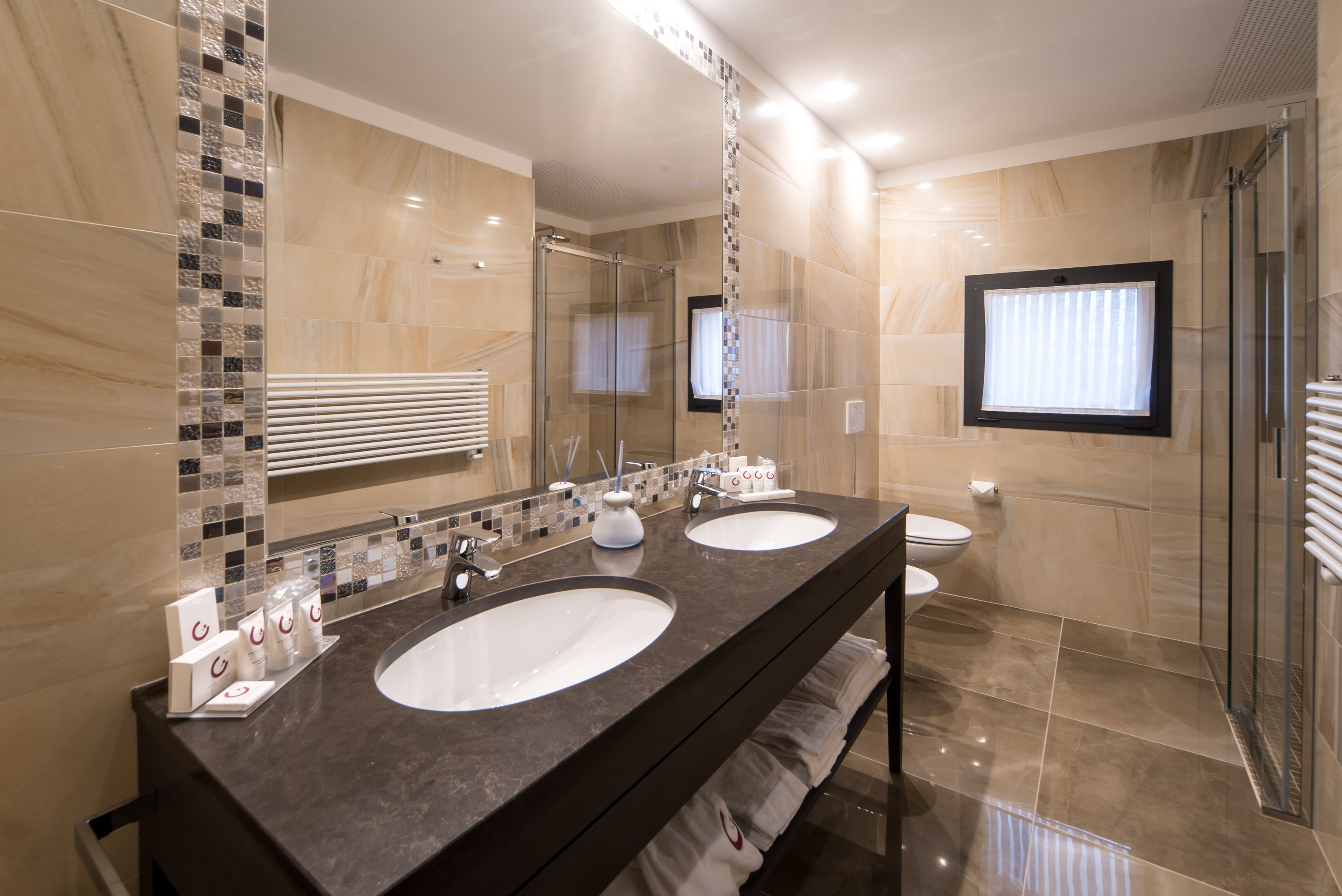 shower, designer toiletries, hair dryer, bathrobes