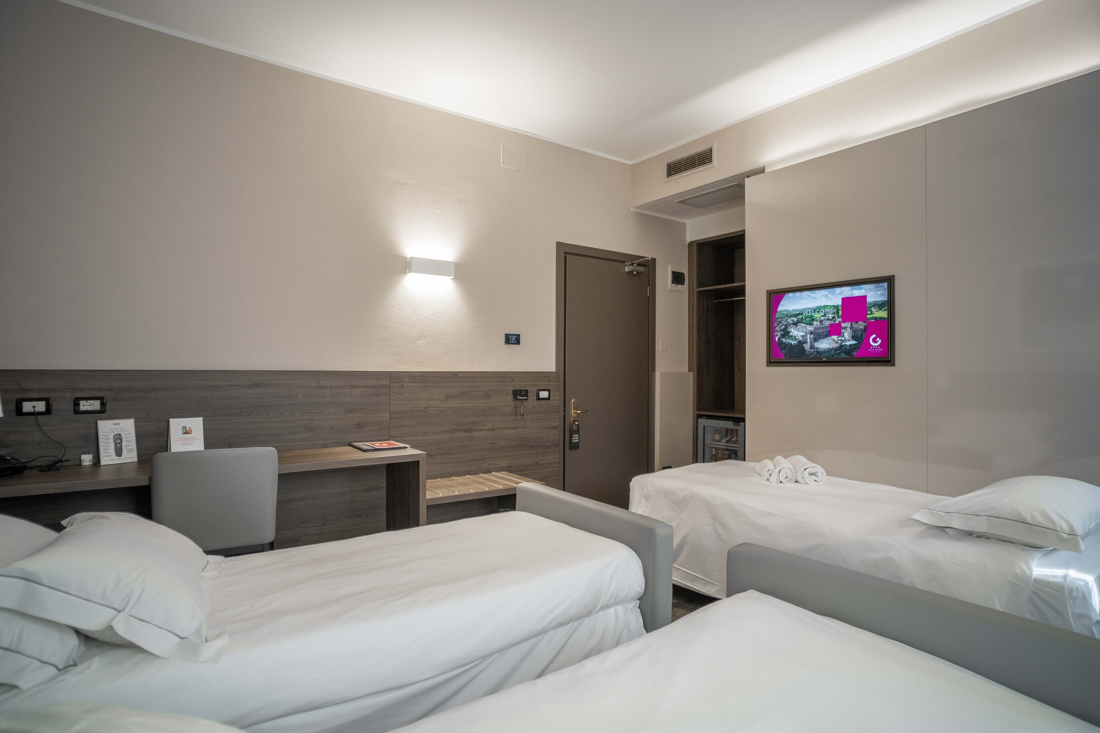 standard triple room | premium bedding, down duvets, memory-foam beds, minibar