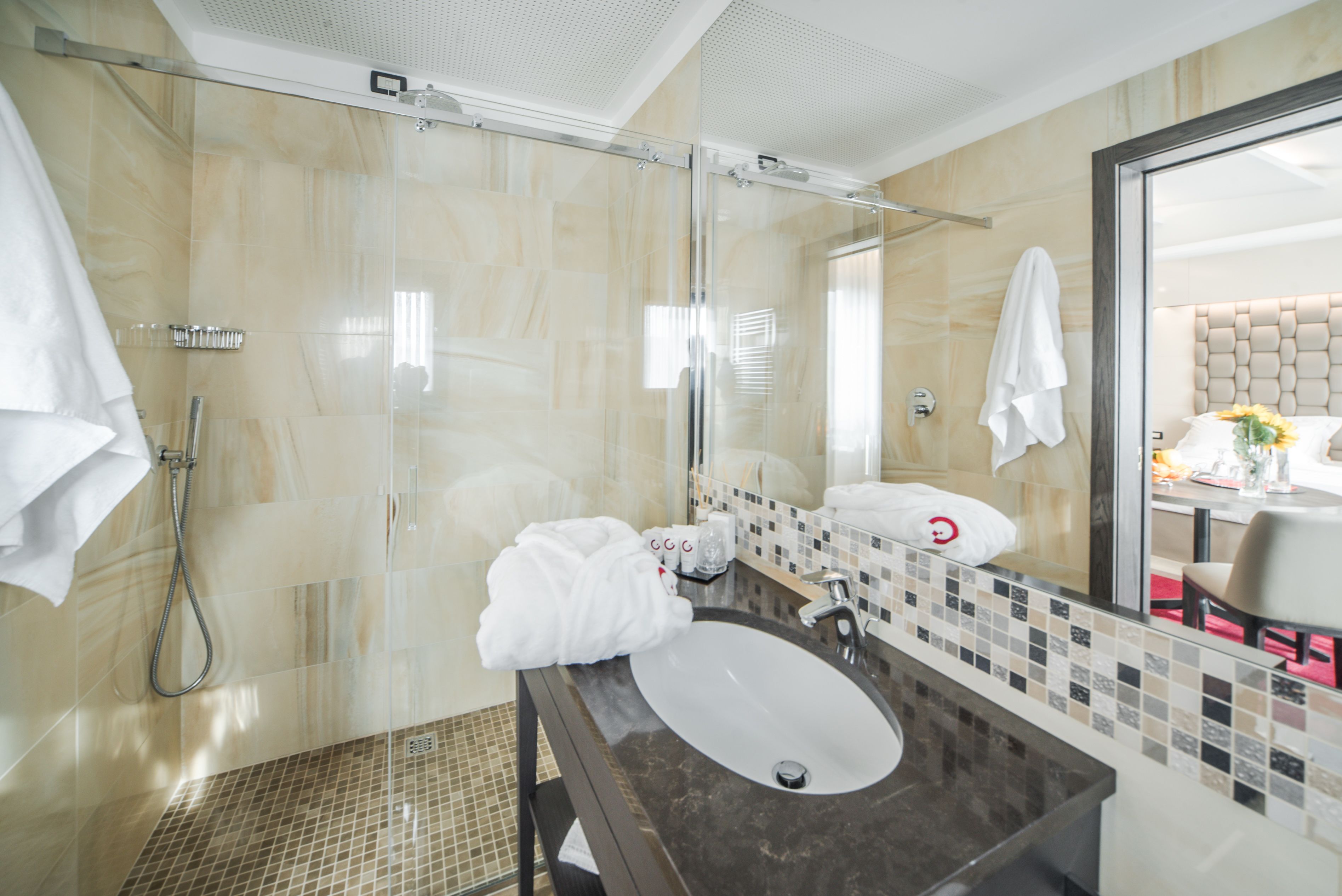 superior double room | bathroom | shower, designer toiletries, hair dryer, bathrobes