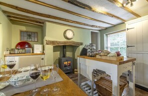 Ground floor: Large kitchen/dining room with wood burning stove