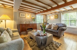 Ground floor: Sitting room with open fire