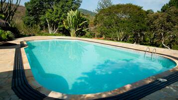 Indoor pool, outdoor pool, pool umbrellas