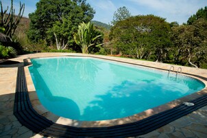 Indoor pool, outdoor pool, pool umbrellas