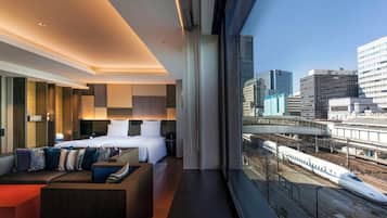 Suite superior, 2 camas individuales, con acceso al salón lounge del club | Ropa de cama de alta calidad y minibar