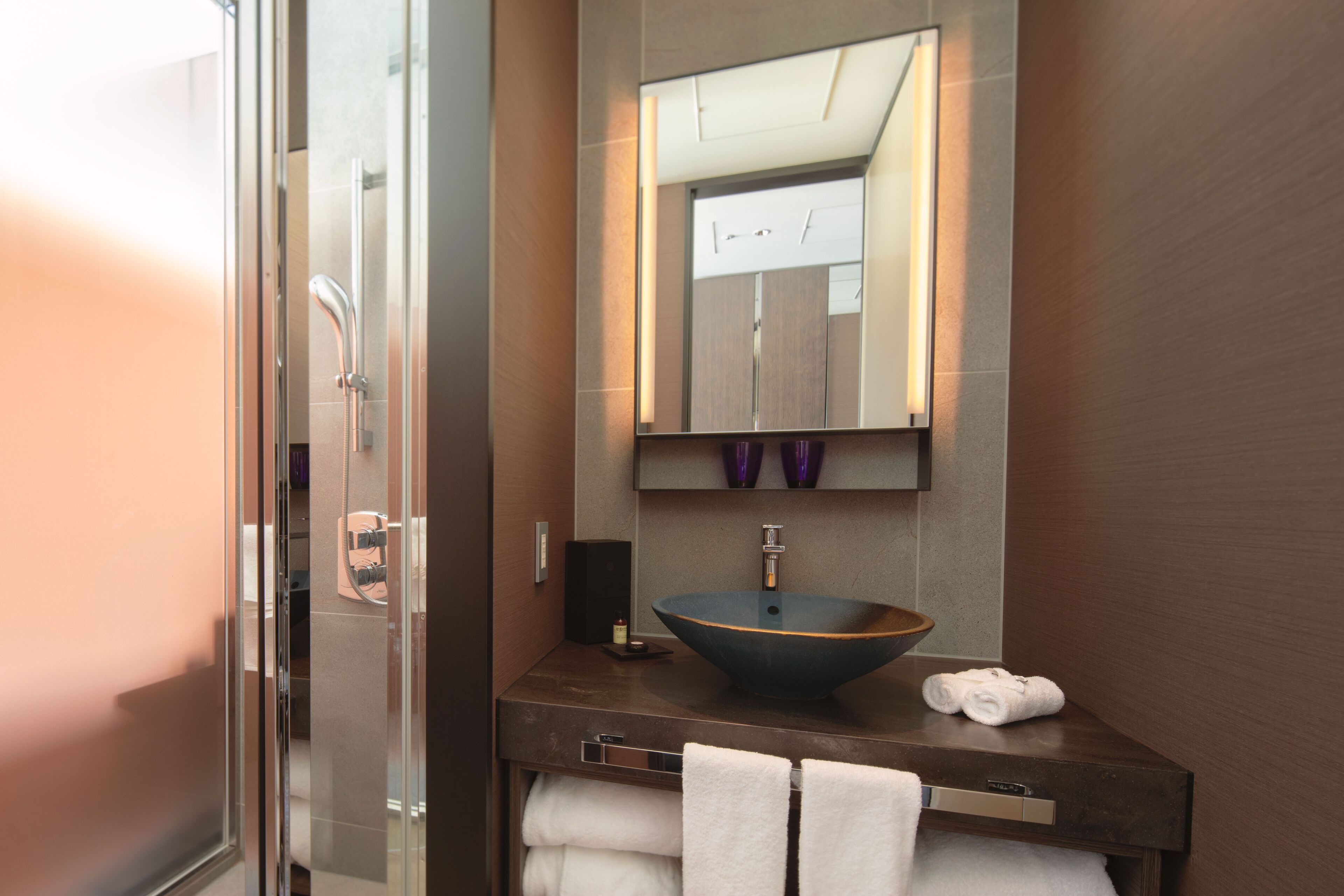 eco-friendly toiletries, hair dryer, bathrobes, slippers