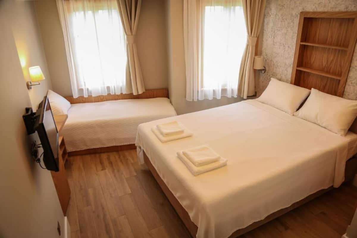 Habitación Deluxe, vistas al mar | 1 dormitorio, ropa de cama de alta calidad, colchones viscoelásticos