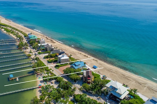 Gemini Beach: 7 BR/4.5BA FL Beach House on 2 beaches, 2 Heated Pools + Dock!