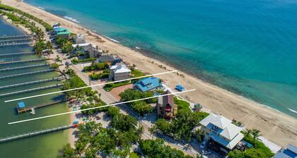 Gemini Beach: 7 BR/4.5BA FL Beach House on 2 beaches, 2 Heated Pools + Dock!