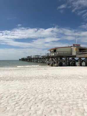 On the beach, sun-loungers, beach towels