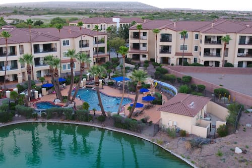 Outdoor pool, open 6 AM to 10 PM, pool umbrellas, sun loungers
