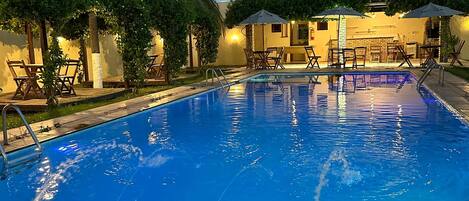 Outdoor pool, open 9:00 AM to 11:00 PM, free pool cabanas, pool loungers