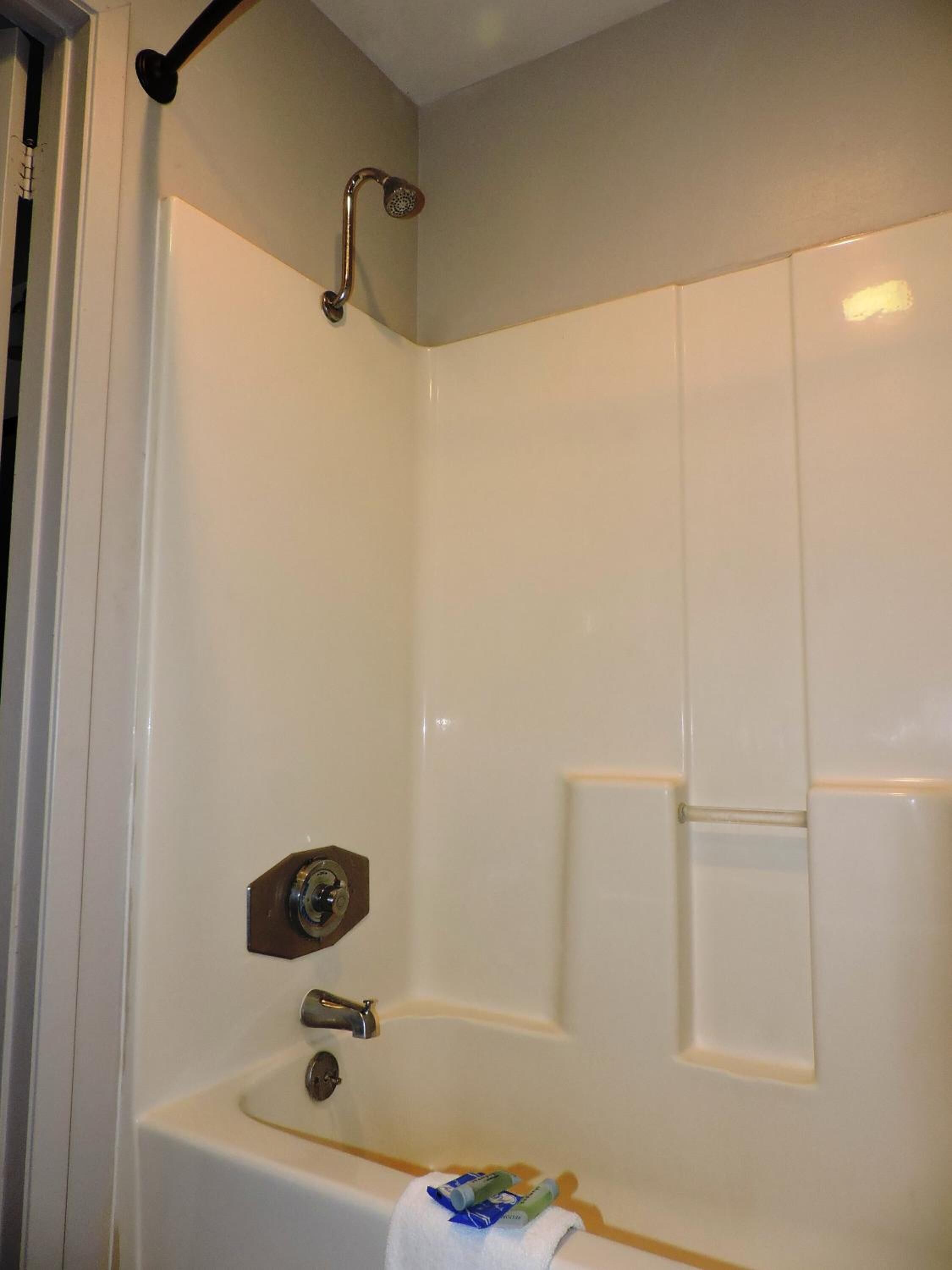 combined shower/bathtub, free toiletries, hair dryer, towels