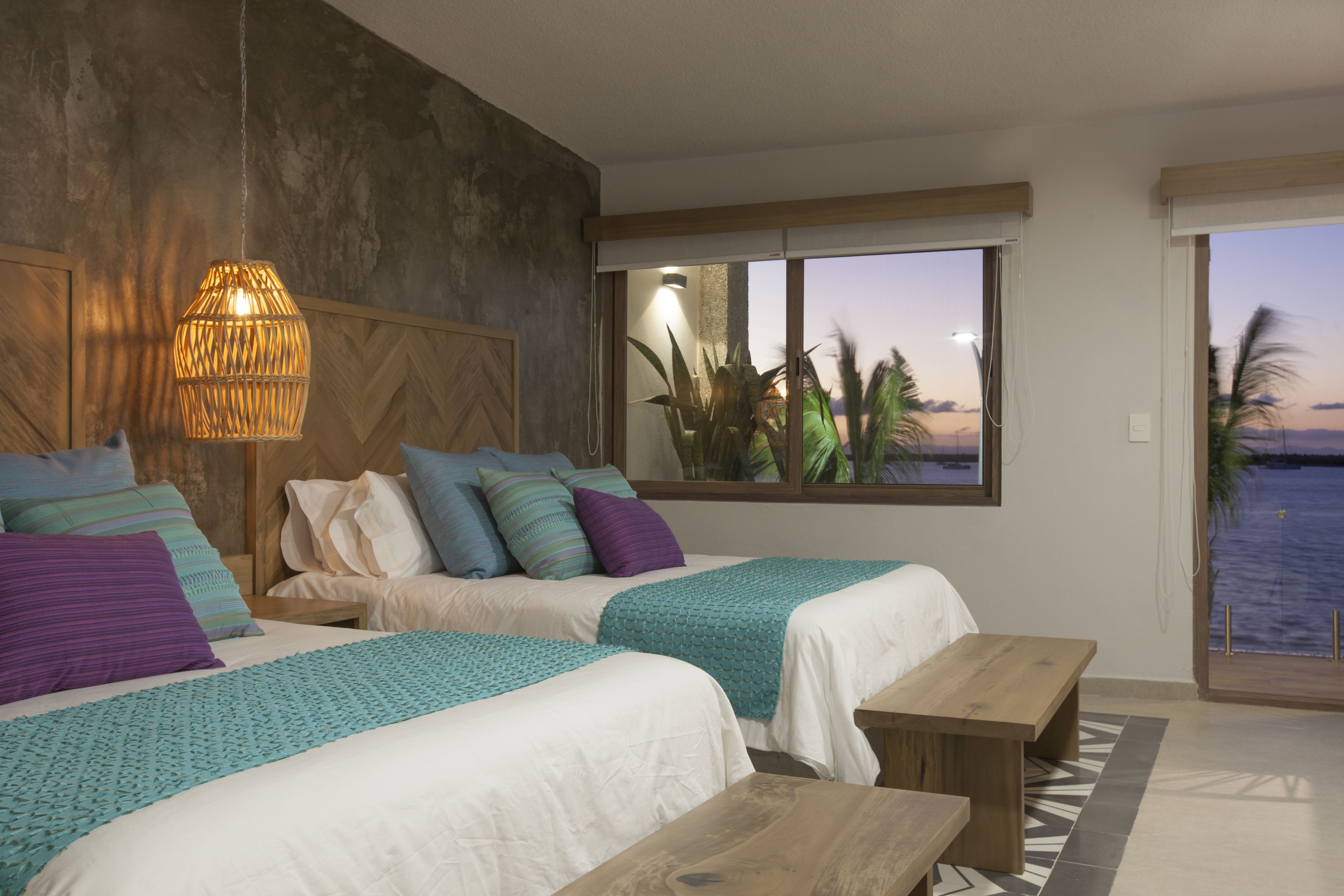 design suite, 1 bedroom, kitchen, beachfront | 1 bedroom, in-room safe, individually decorated, individually furnished