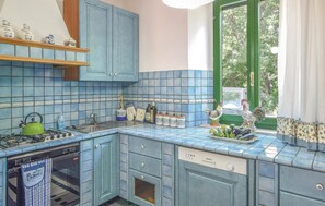 Fridge, stovetop, dishwasher, coffee/tea maker