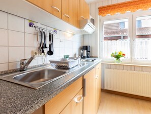 Fridge, microwave, coffee/tea maker, toaster