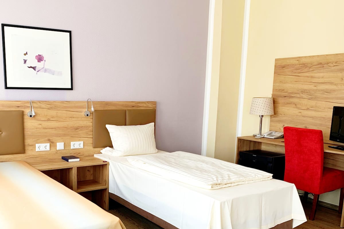 Desk, WiFi (free), bed sheets