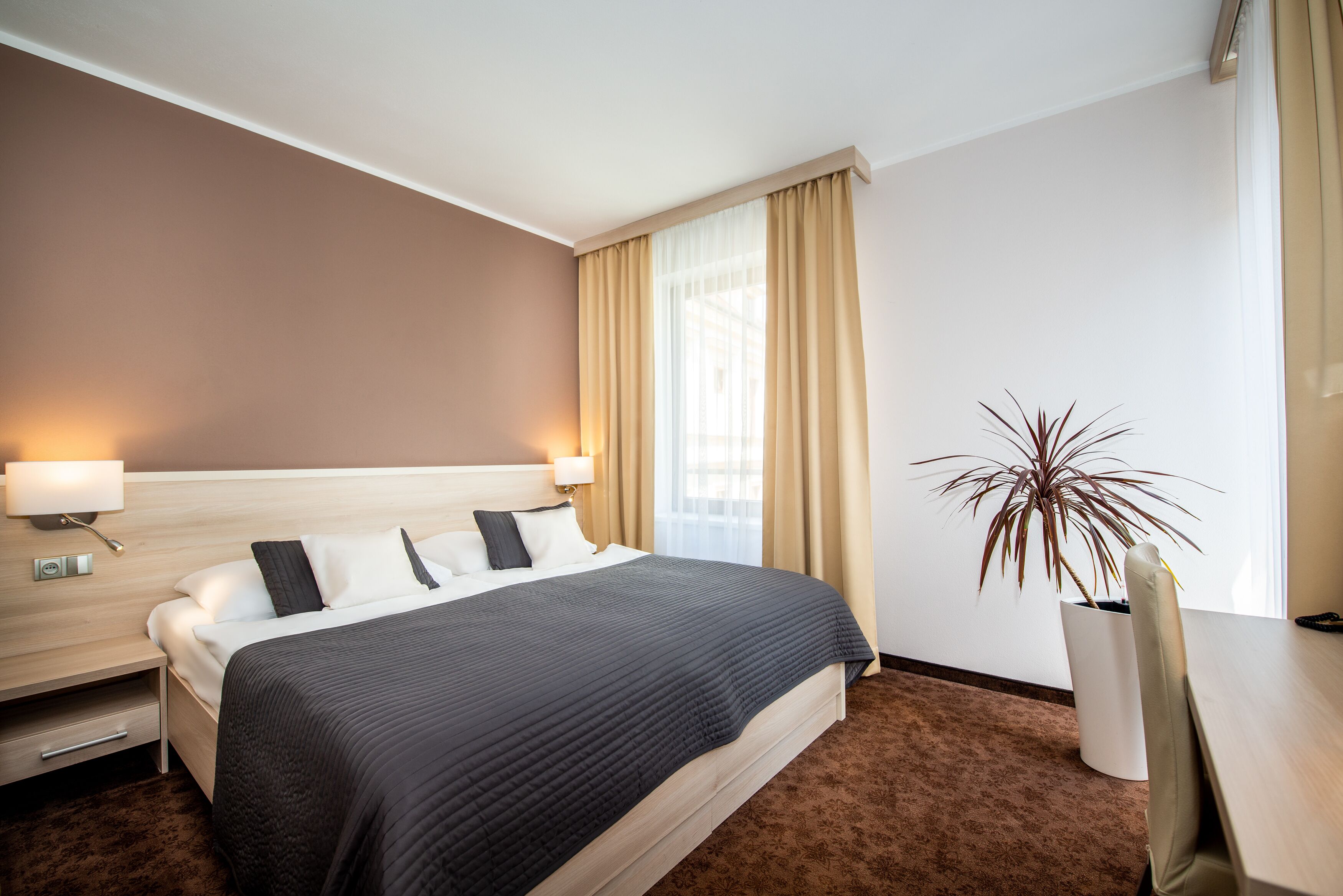 Comfort Double Room | Minibar, in-room safe, desk, blackout curtains