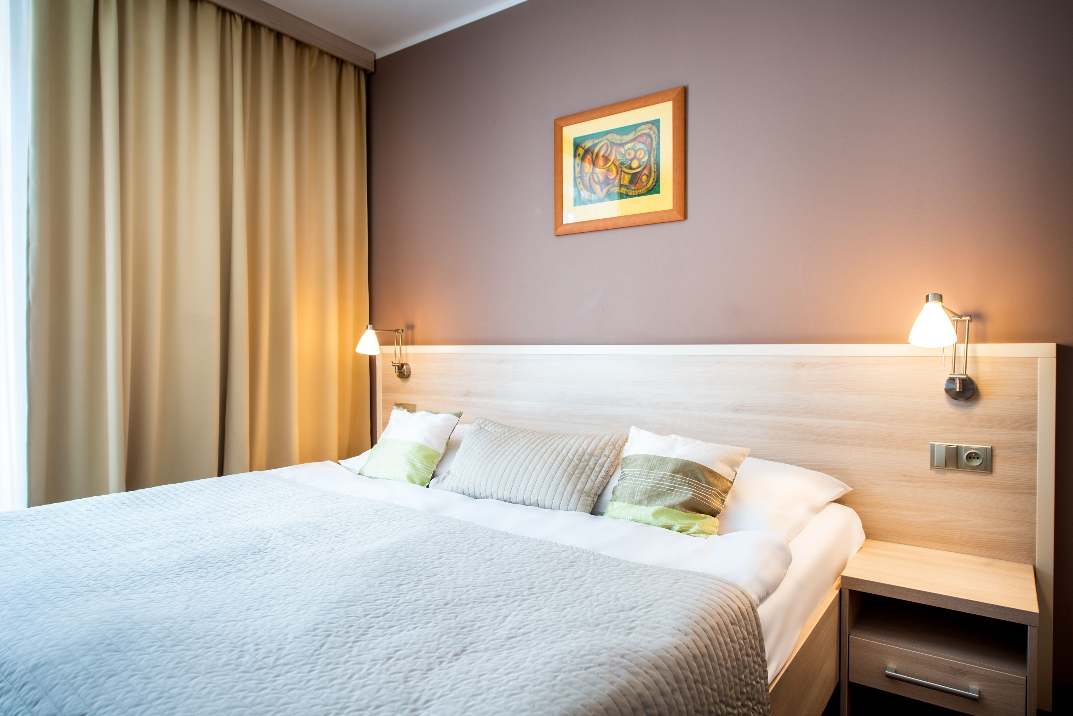 Standard Double Room | Minibar, in-room safe, desk, blackout drapes