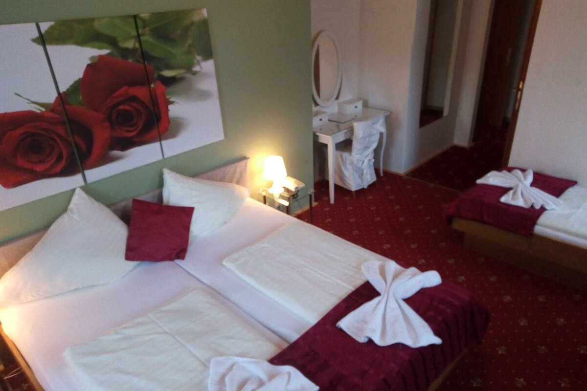 standard triple room, 1 bedroom, mountain view | 1 bedroom, in-room safe, individually decorated, individually furnished