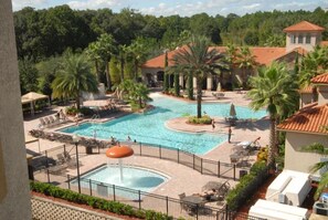 A heated pool - Gorgeous Condo in Prestigious Championsgate Golf Resort Community w View of Pool (Championsgate)