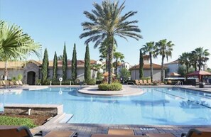 A heated pool - Gorgeous Condo in Prestigious Championsgate Golf Resort Community w View of Pool (Championsgate)