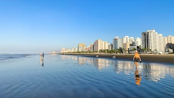 On the beach, sun-loungers