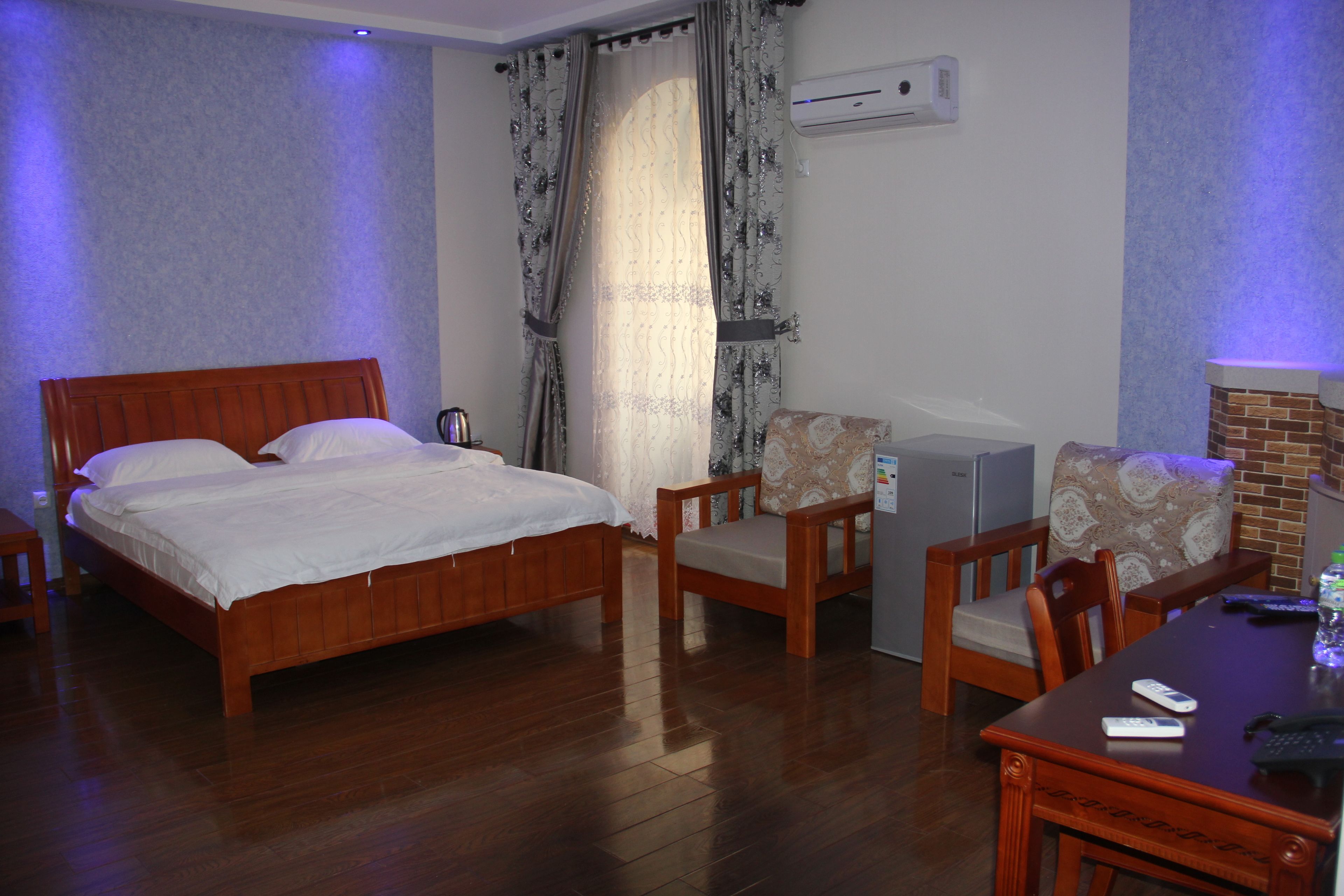 individually furnished, desk, laptop workspace, iron/ironing board