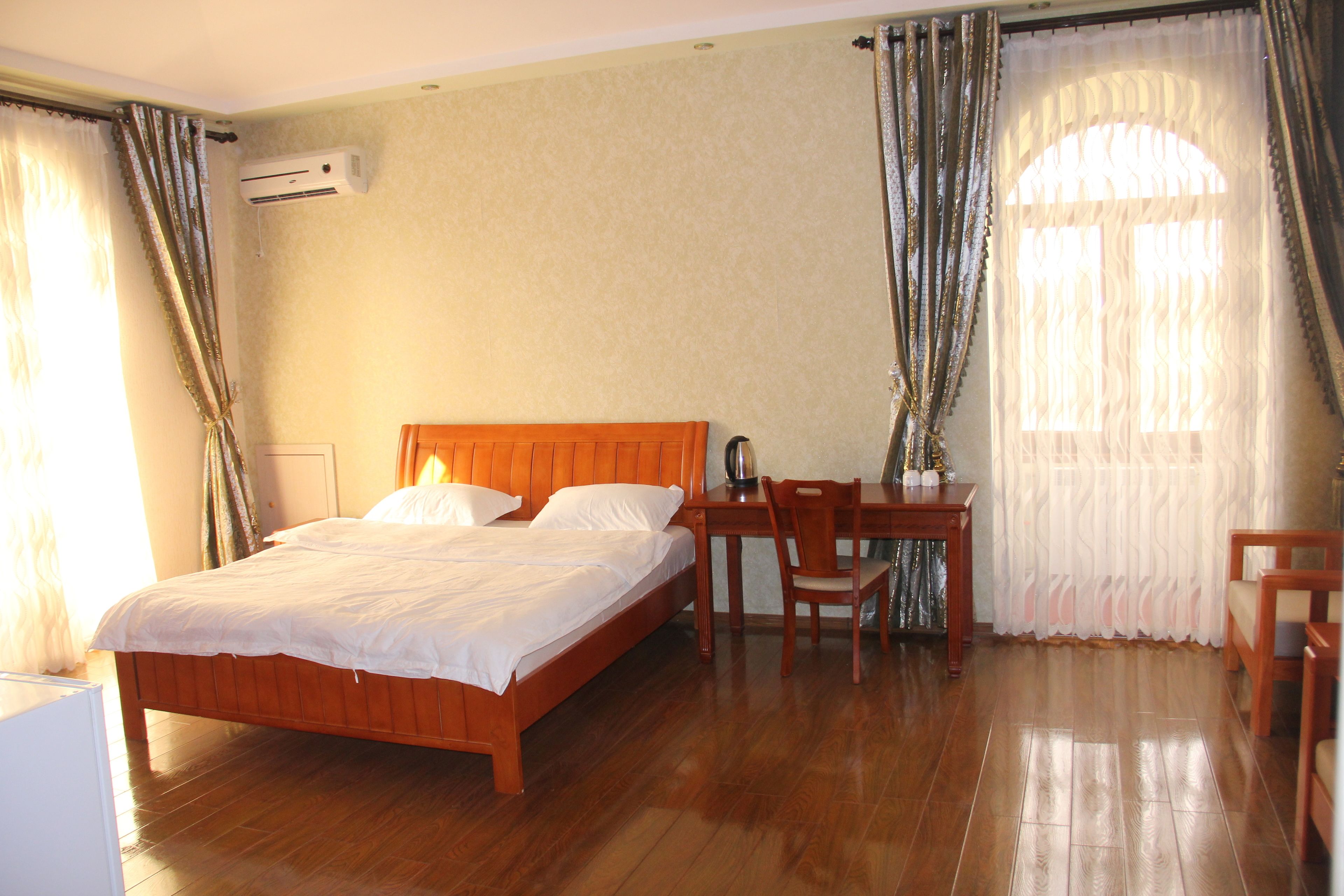 individually furnished, desk, laptop workspace, iron/ironing board