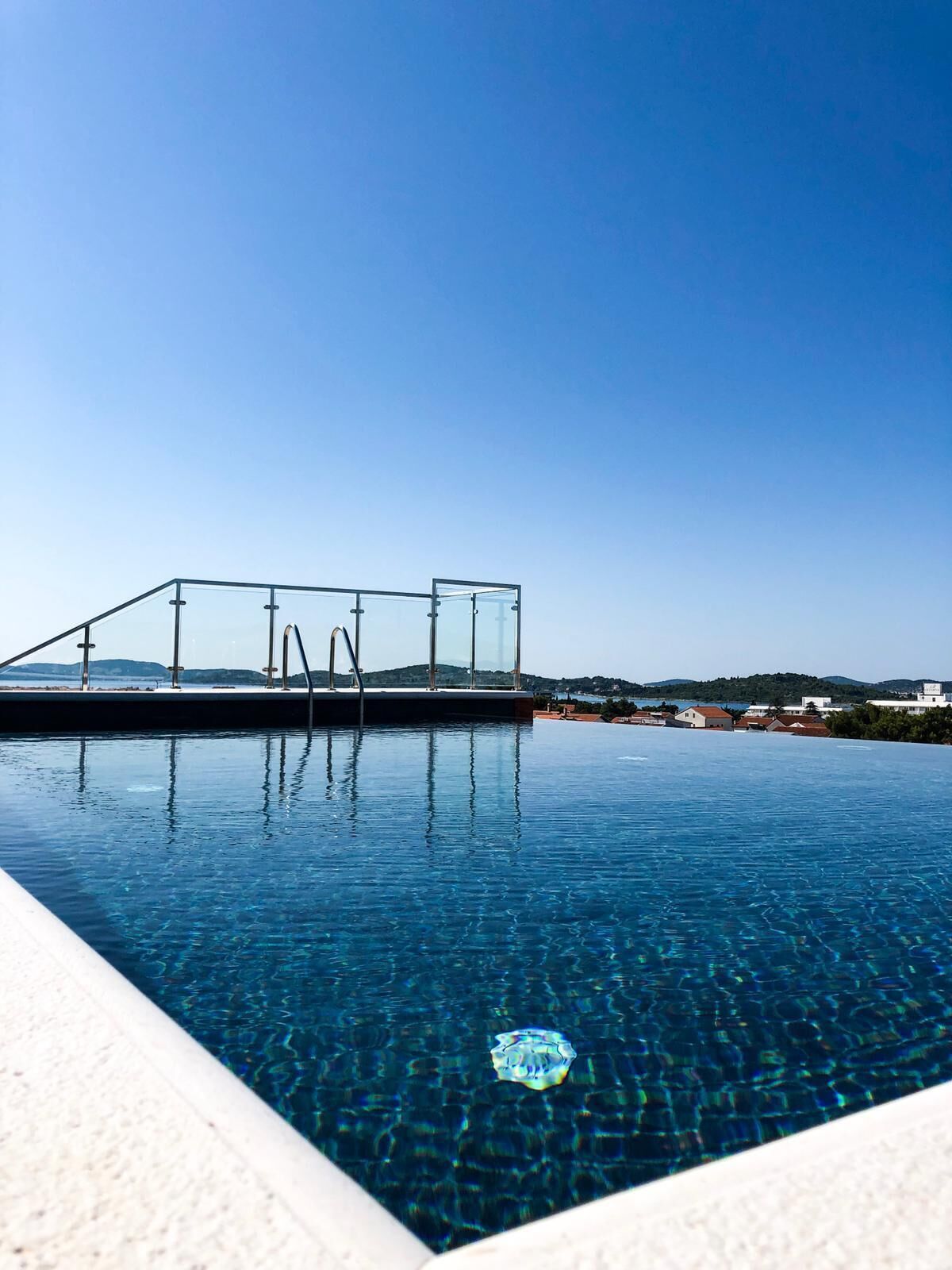 outdoor pool, pool loungers