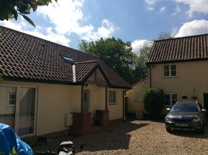 The stable shares a courtyard with the main house.