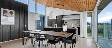 Fridge, stovetop, dishwasher, coffee/tea maker