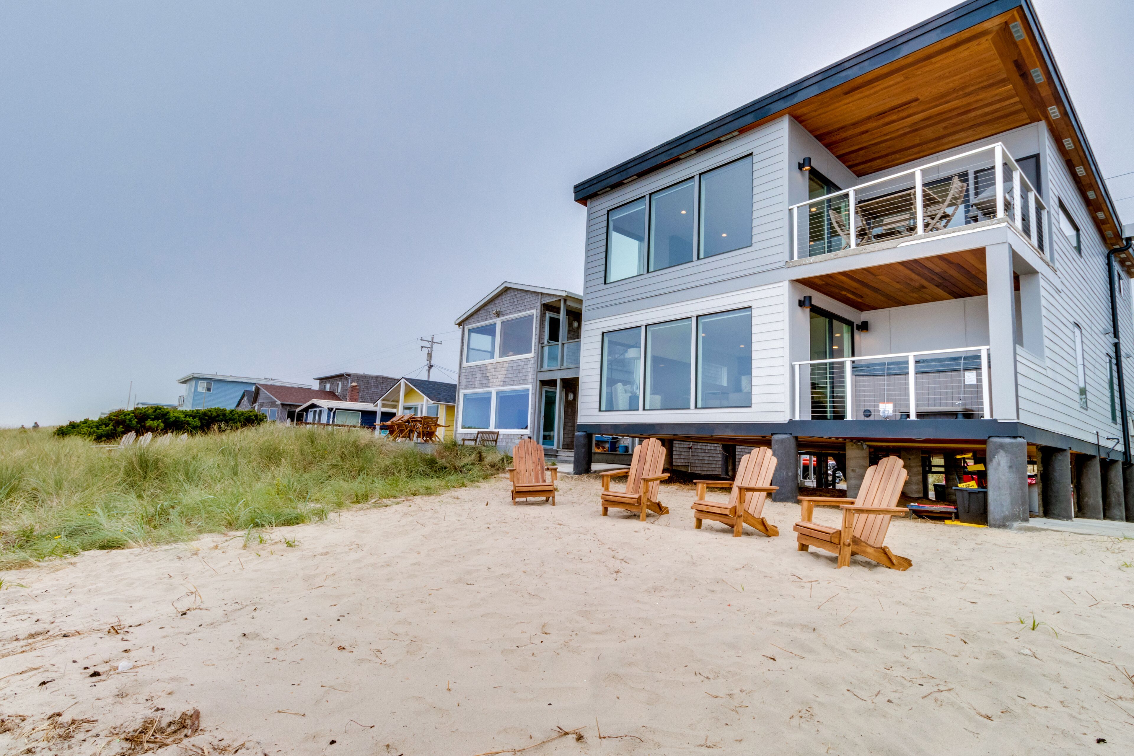 Dog-friendly beachfront house with private hot tub & incredible views