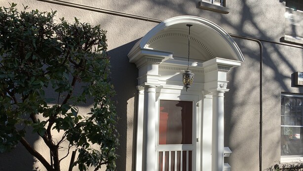 A house with a white front door, a small porch, and a mailbox. - Stunning, Large, Beautifully Decorated Home in Downtown Lodi with Spa Amenities  (Lodi)