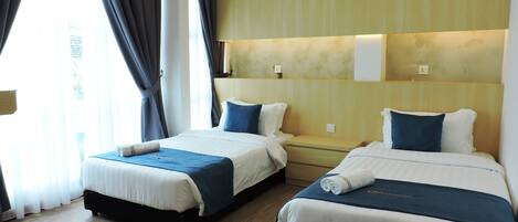 高级套房, 2 间卧室 | 高档床上用品、遮光窗帘、熨斗/熨板、免费 WiFi