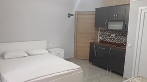 Basic Triple Room, Private Bathroom | Living area | TV - Gunay Pansiyon Antalya (Antalya)