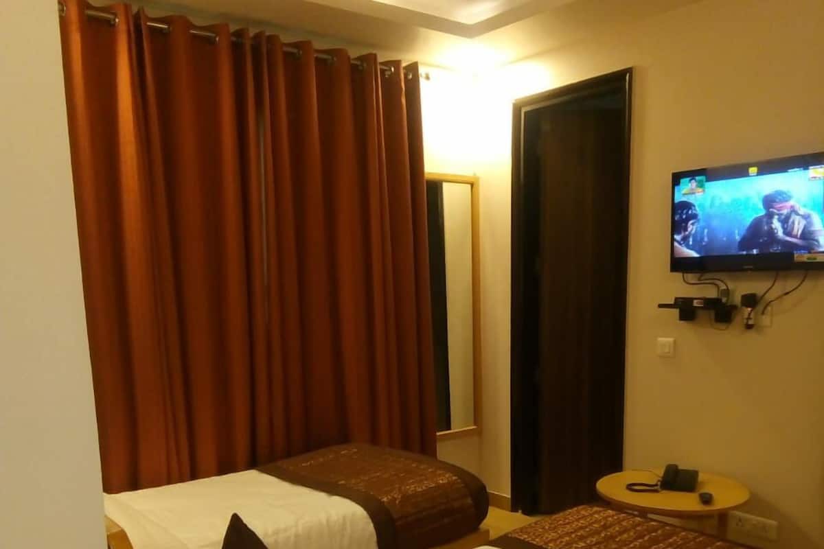 Blackout drapes, rollaway beds (surcharge), WiFi (free)
