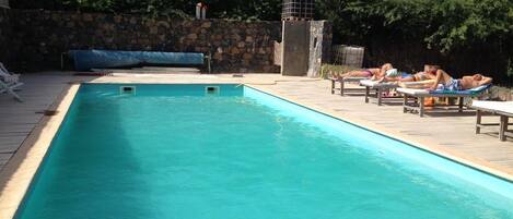 Outdoor pool, pool umbrellas, pool loungers