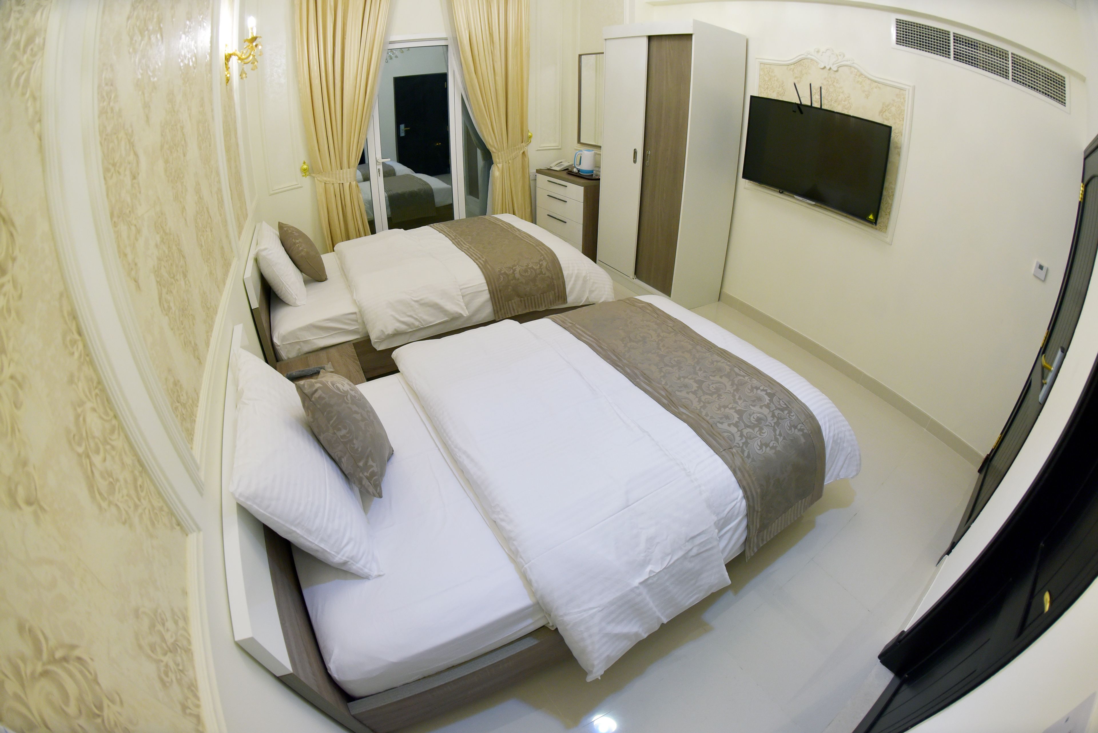 twin room | in-room safe, desk, laptop workspace, blackout curtains