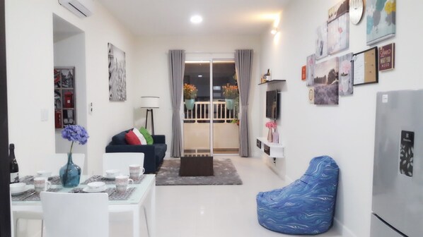 City Condo, 2 Bedrooms, Pool Access, City View | Living area | 42-inch Smart TV with cable channels, TV - Horse Square Apartment (Ho Chi Minh City)