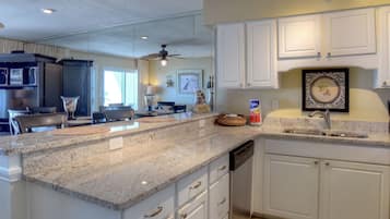 Coffee/tea maker, fridge, microwave, oven