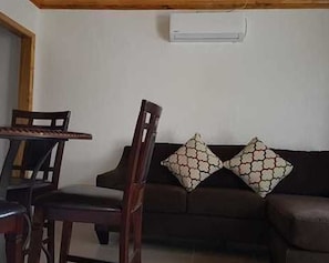 Apartamento estándar, 2 camas de matrimonio, no fumadores | Zona de estar