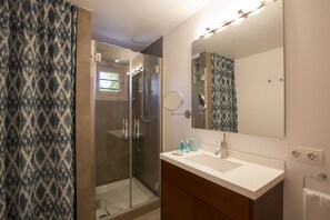 Shower, hair dryer, towels, soap