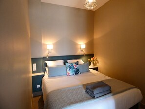 1 slaapkamer, een strijkplank/strijkijzer, wifi, beddengoed